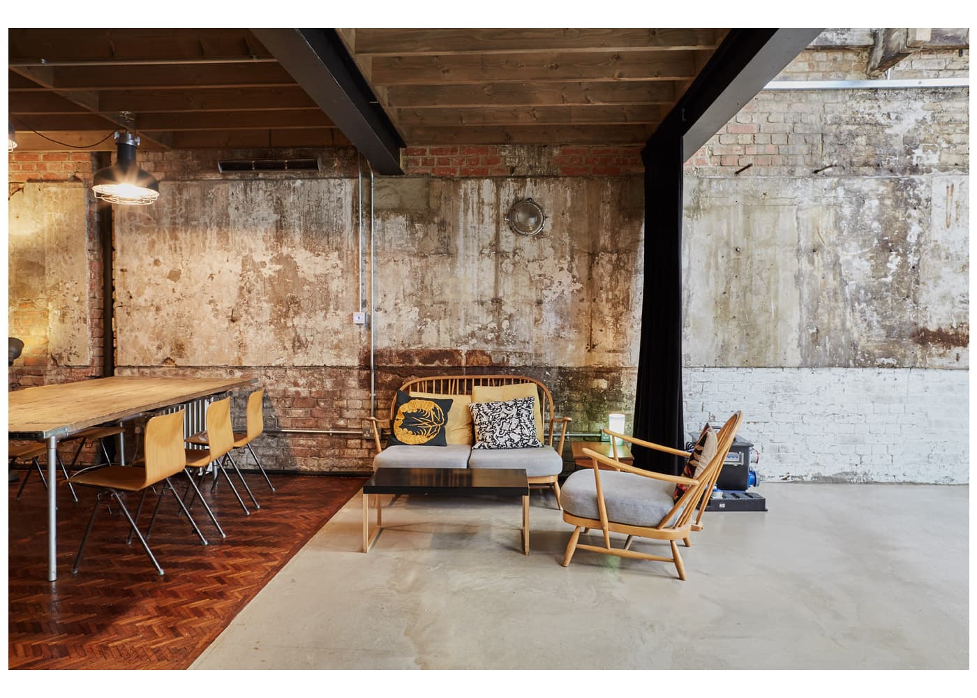 CTRL Old Street podcast studio lounge with exposed brick walls and seating in Islington N1
