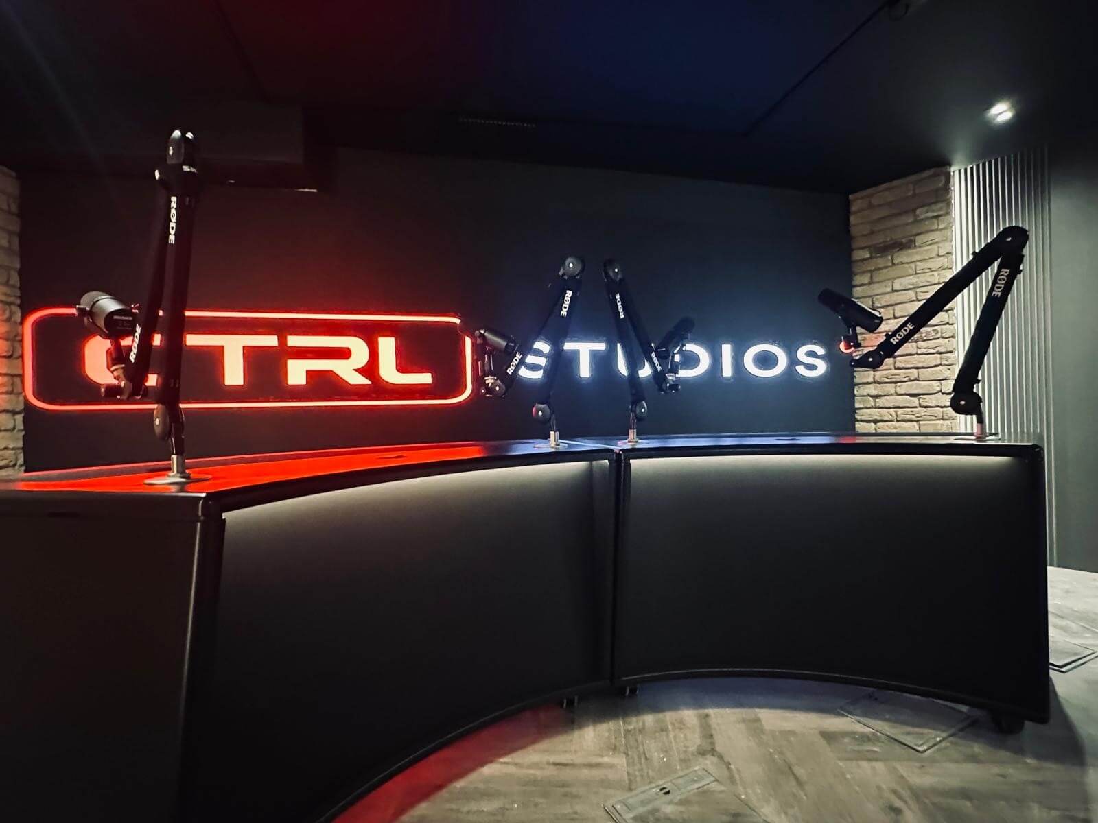 The Main Stage four microphone podcast desk at CTRL Old Street